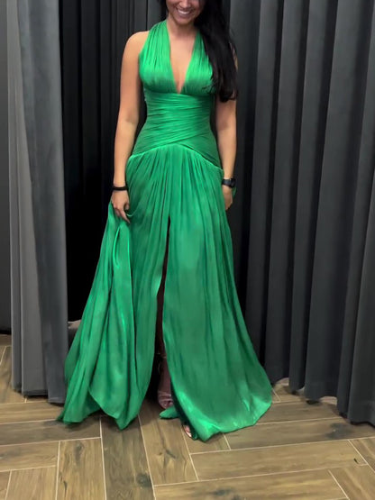Emerald Green Plunging Neckline Gown With Pleated Skirt And Side Slit
